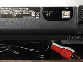 Photo shows the back side of the Audio-Technica AT-LP120-USB. Visible are the RCA and USB outputs and Line/Phono switch.