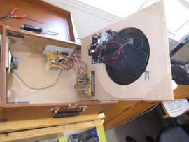 Photo shows the Crosley CR249 inside the case. The belt is dangling underneath the pulley.